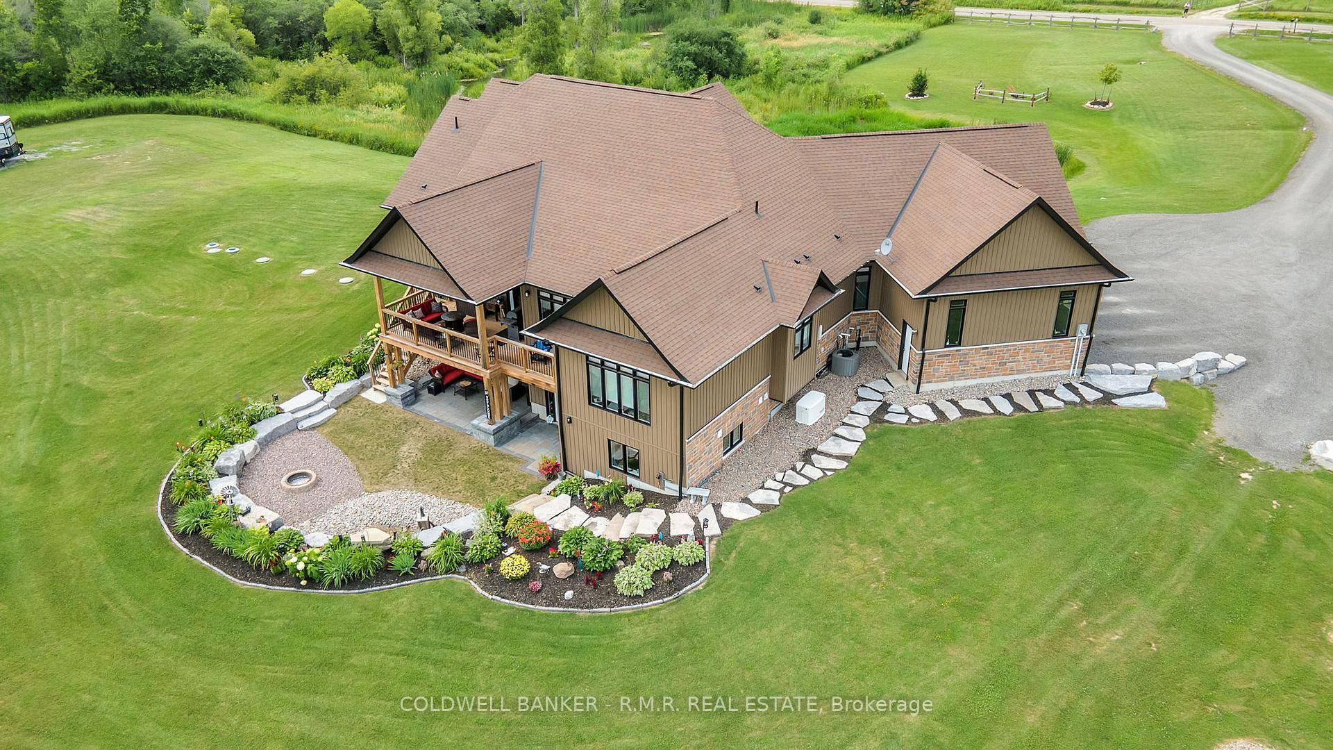 Welcome to an unparalleled oasis of luxury nestled within the picturesque landscape of a professionally manicured 3.