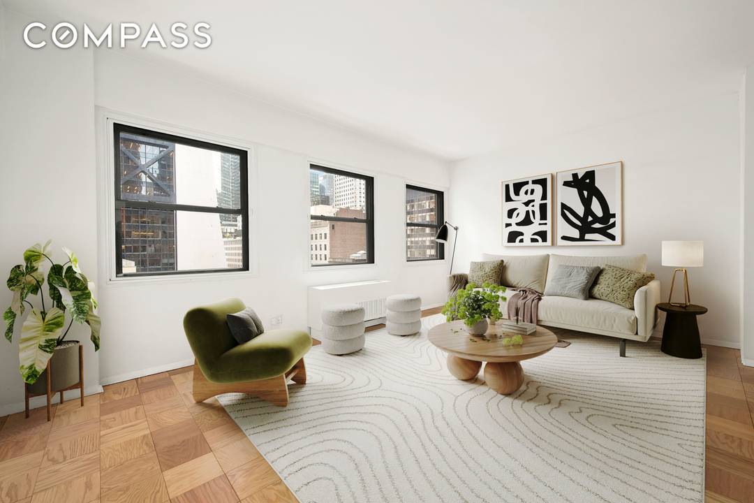Prime Central Park South Living Convertible One Bedroom Opportunity Welcome to Residence 10D at 58 West 58th Street, an extra large alcove studio offering exceptional scale and an effortless conversion ...
