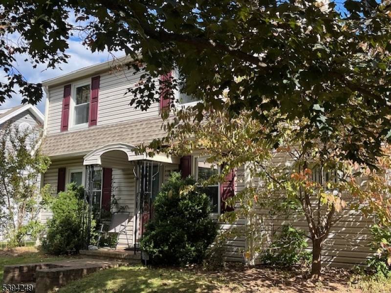 Nice 3 BR home with detached oversized garage and 2 storage sheds.