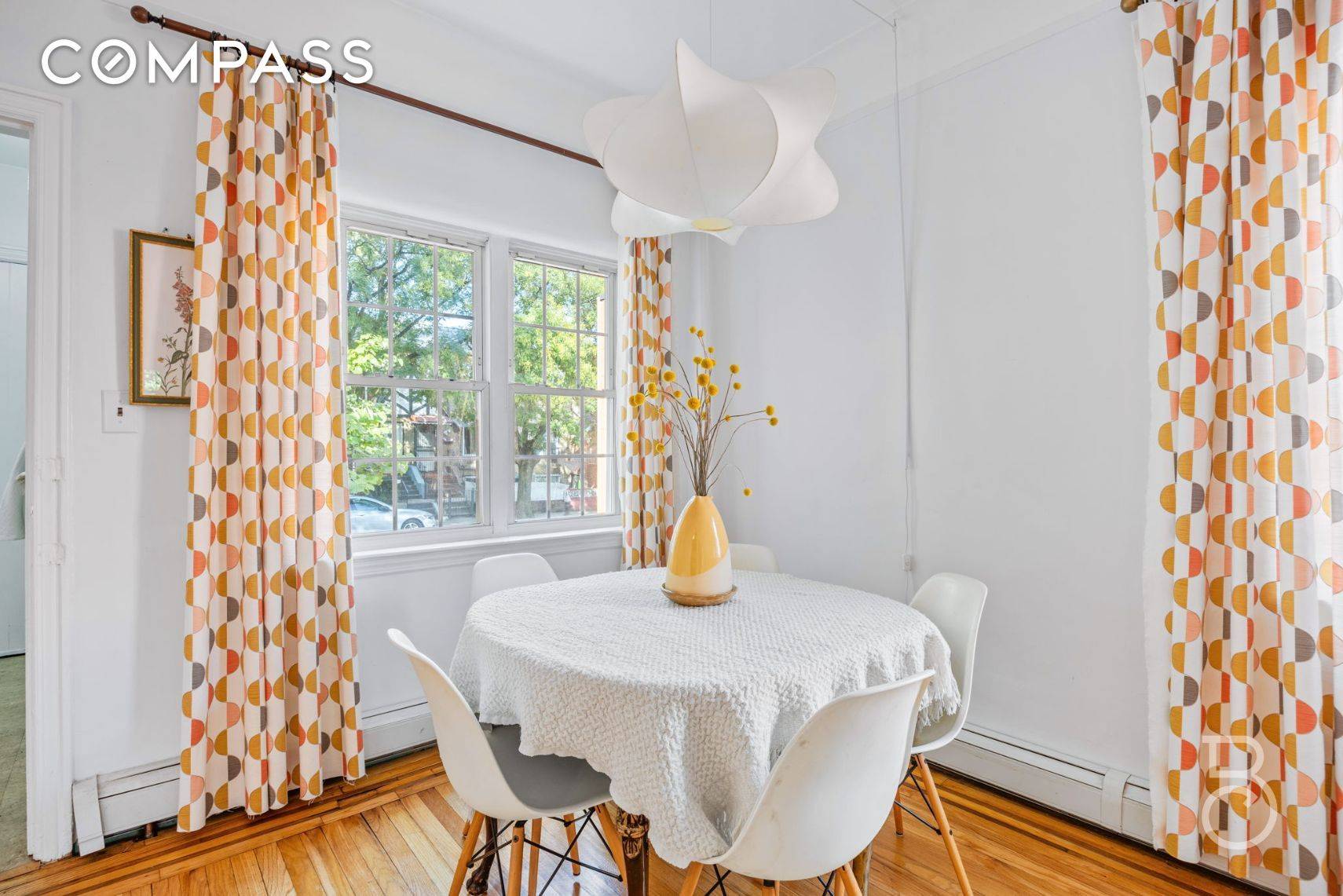Lovingly maintained and ready for its next chapter, this hard to find semi detached two family brick home enjoys windows on three sides for abundant natural light and cross ventilation.