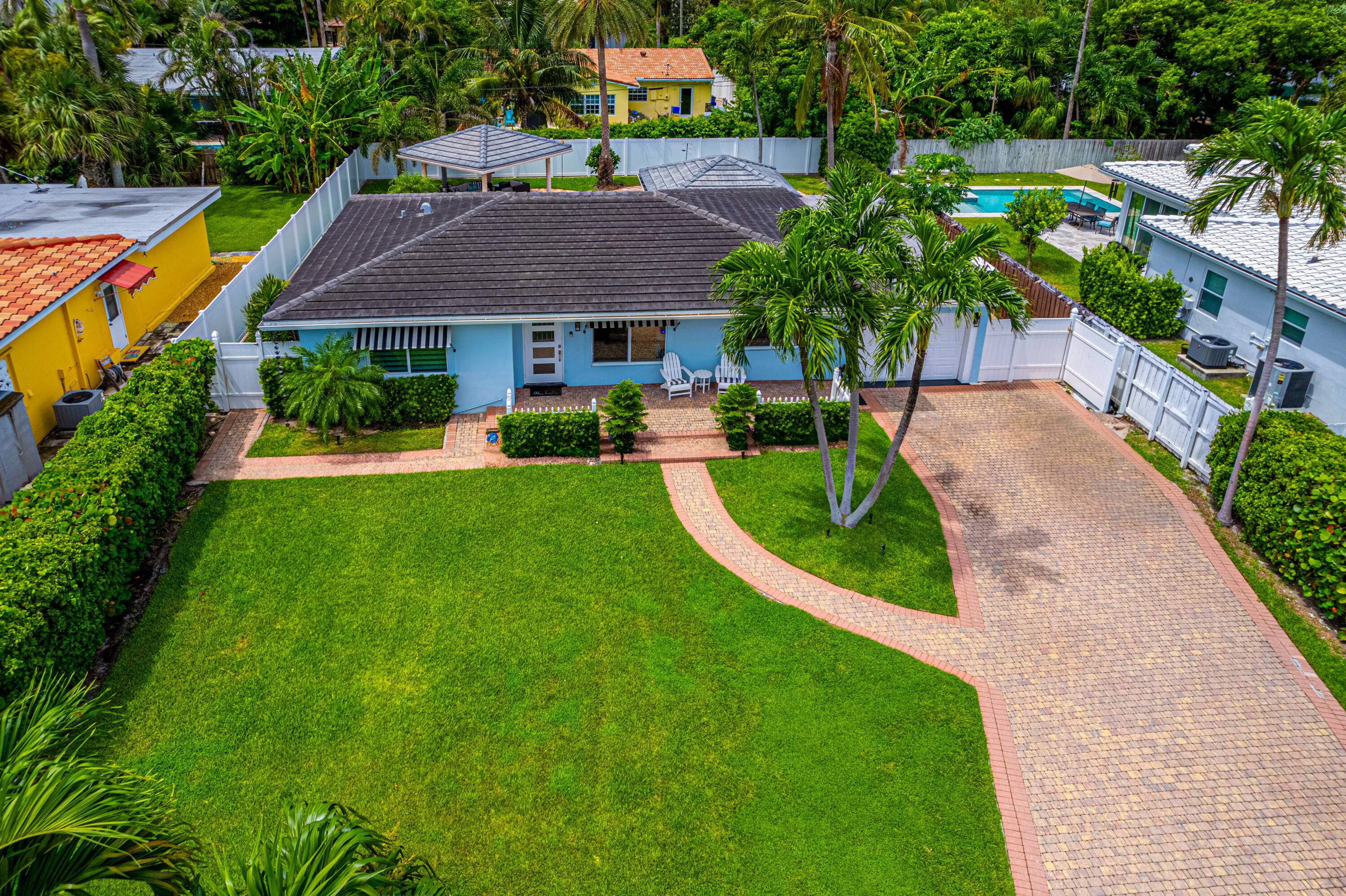 Magnificent Beach House in the prestigious Boca Riviera Island community.