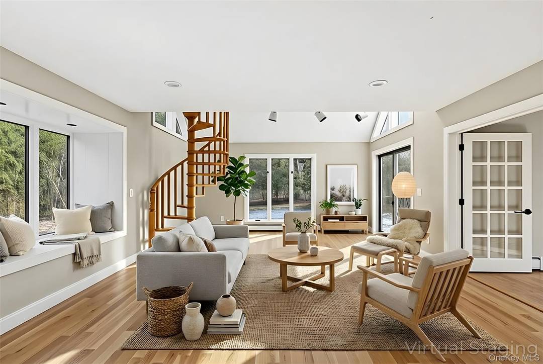 Fall in love where you live in this stylishly renovated gem set on 1.