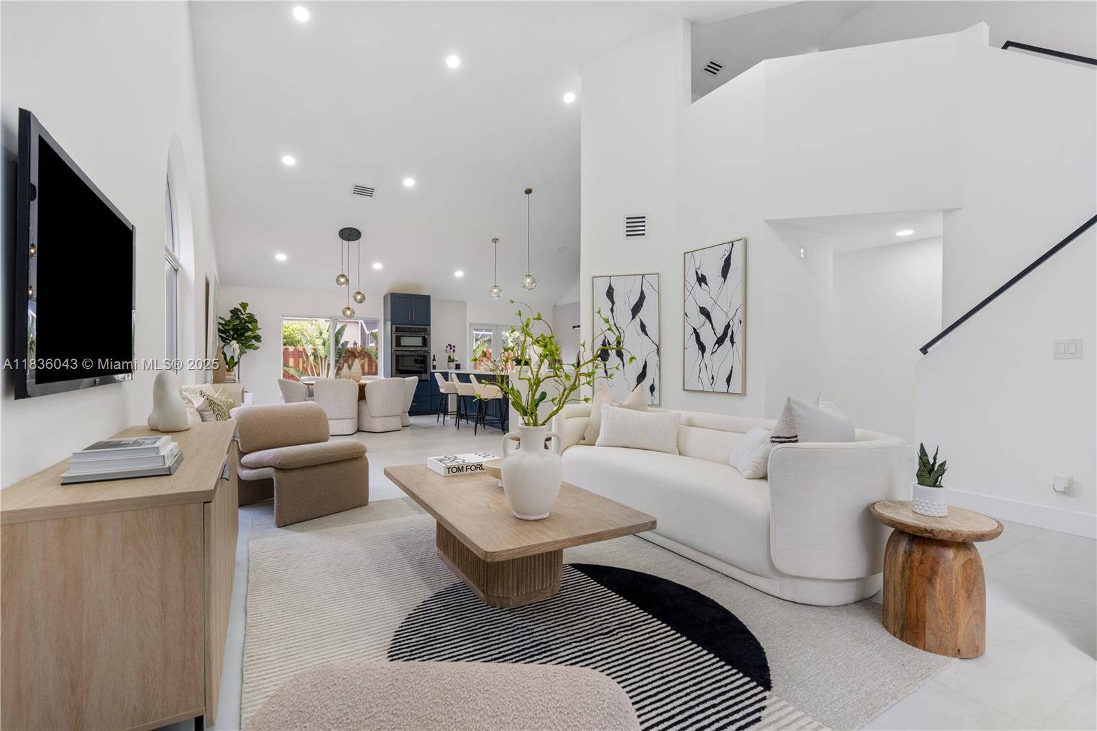 Beautifully and completely renovated 3 bedroom, 2 bathroom, and 1 2 bathroom home in the desirable, guard gated community of Embassy Lakes.