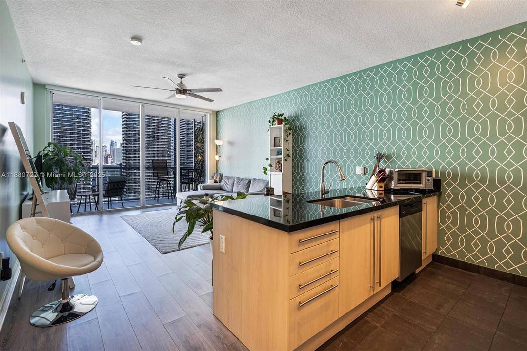 Gorgeous 1BD 1BA condo at Axis on Brickell featuring stunning city views, abundant natural light, and a spacious balcony.