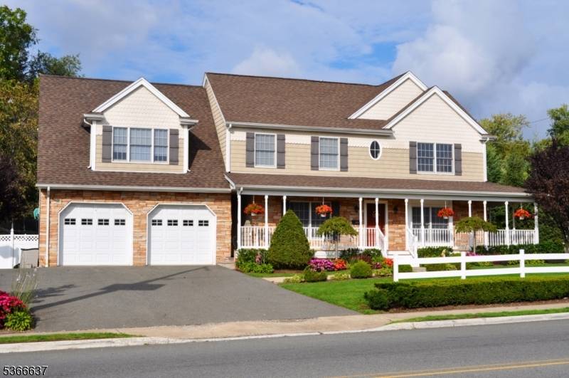 An exquisite, modern, well maintained 2 family home located in the heart of Haledon.