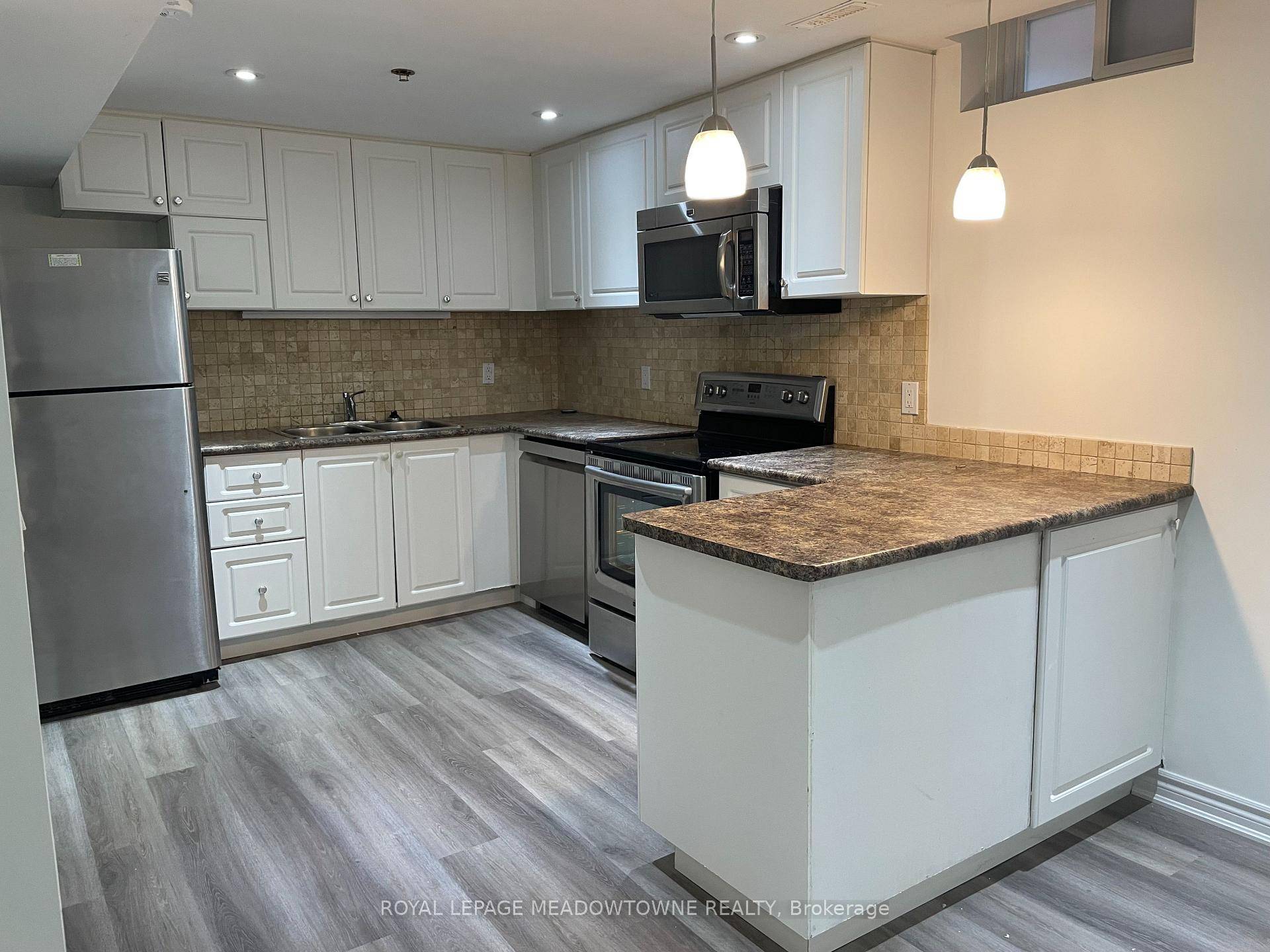 This bright and comfortable basement apartment offers the perfect living space for an individual, couple, or small family.
