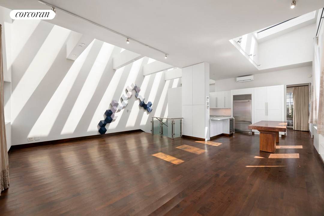 Welcome to the stunning Penthouse at 554 Broome Street, a captivating pre war condo situated right in the vibrant heart of SoHo !