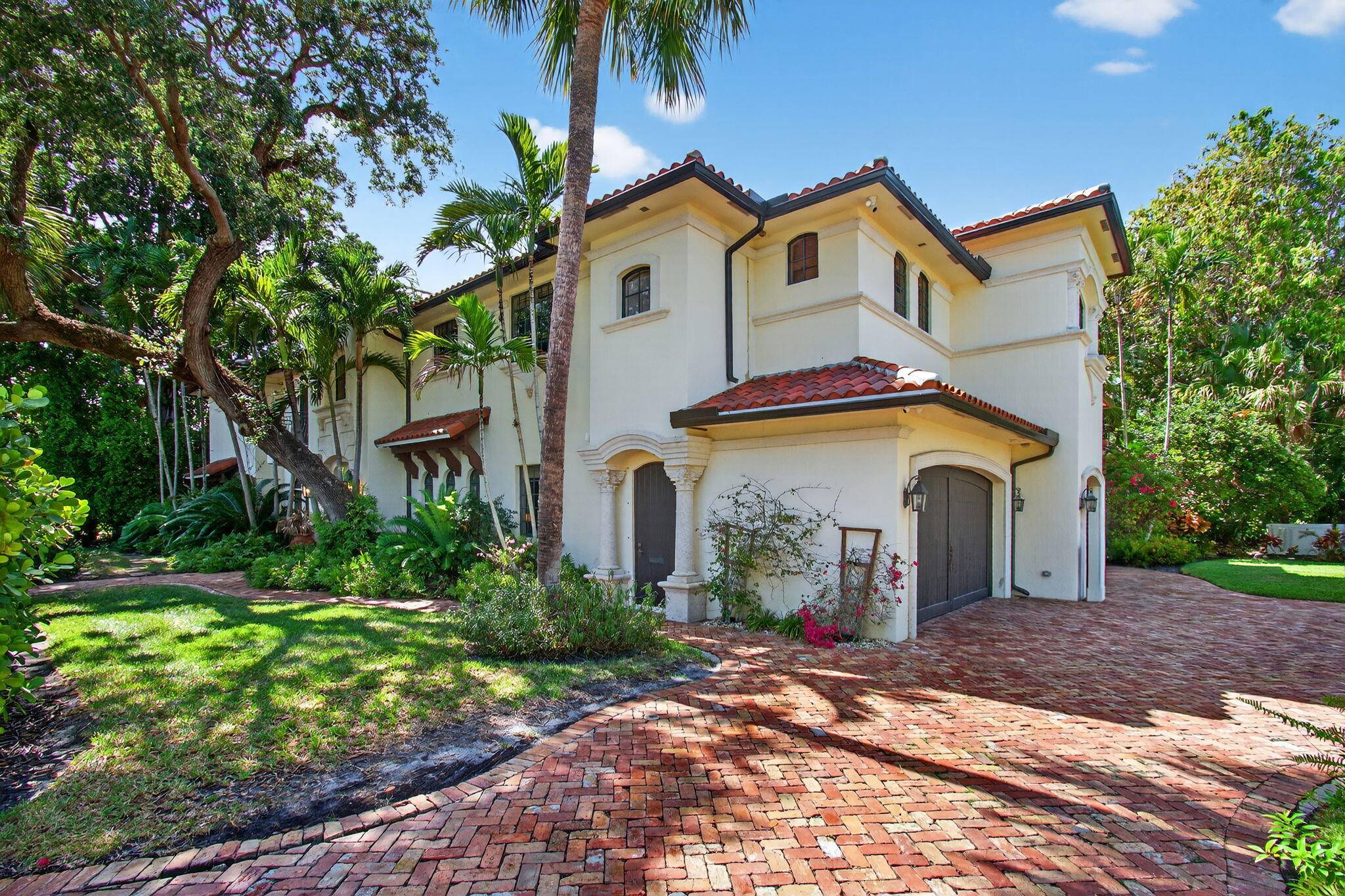 Ultimate elegance ! This remastered estate is on an oversized corner lot in Boca's esteemed Old Floresta neighborhood.