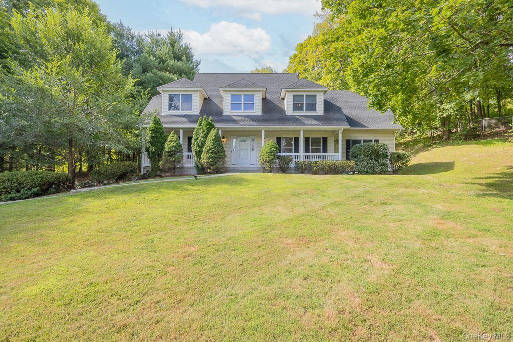 Nestled at the end of a quiet cul de sac, this updated Farmhouse Colonial offers space, privacy, and convenience.