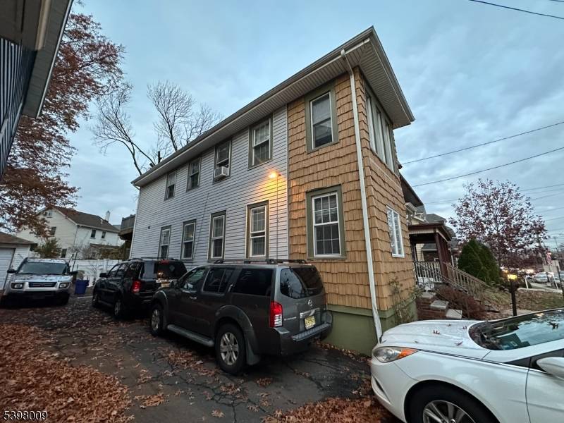 Fantastic Two Family Opportunity in Roselle Park with exclusive driveway, 2 stories building, 3 bedrooms, 2 bathrooms, plus rec.