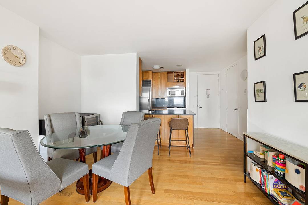 This spacious, light flooded two bedroom, two bath gem features beautiful views of the water and New York City through oversized south facing windows !