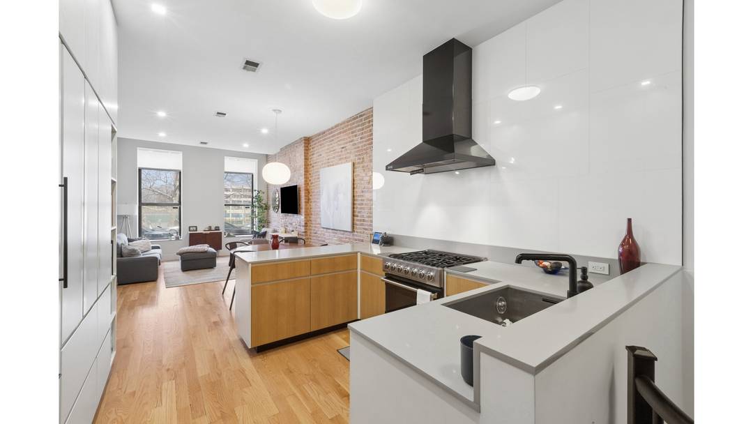 This beautifully designed garden duplex offers the scale and flexibility of a townhouse with the charm and character of classic brownstone living.