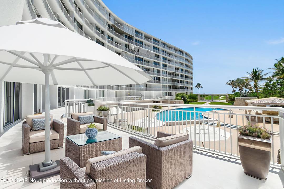 This exquisite east facing lanai apartment offers two bedrooms and two baths with a spacious open floor plan, seamlessly blending indoor comfort with outdoor beauty.