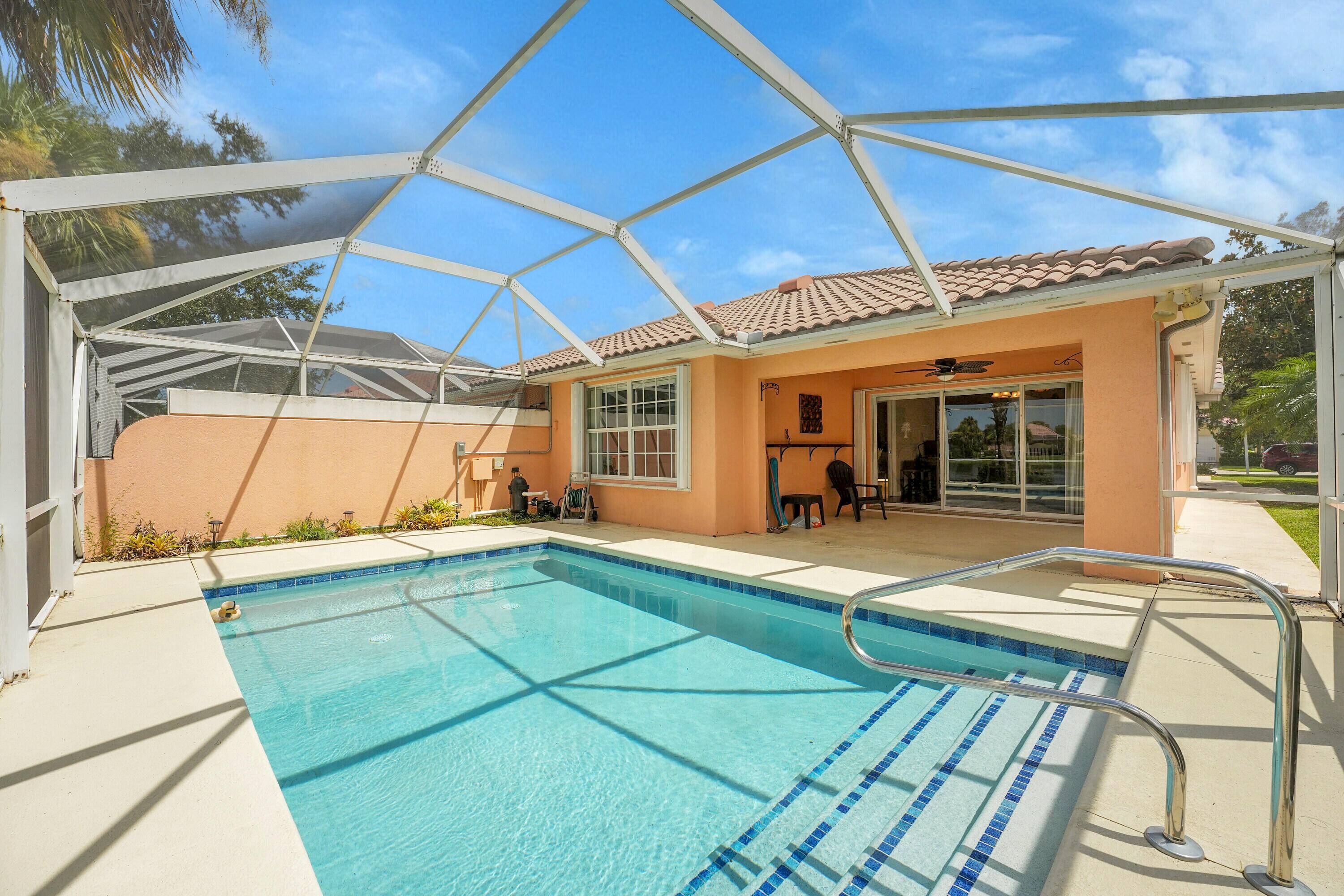 Stunning Waterfront Villa with Private Pool in Lakes at Tradition Enjoy peaceful lakefront living in this charming 2 bedroom, 2 bath villa featuring a private screened pool that's been freshly ...