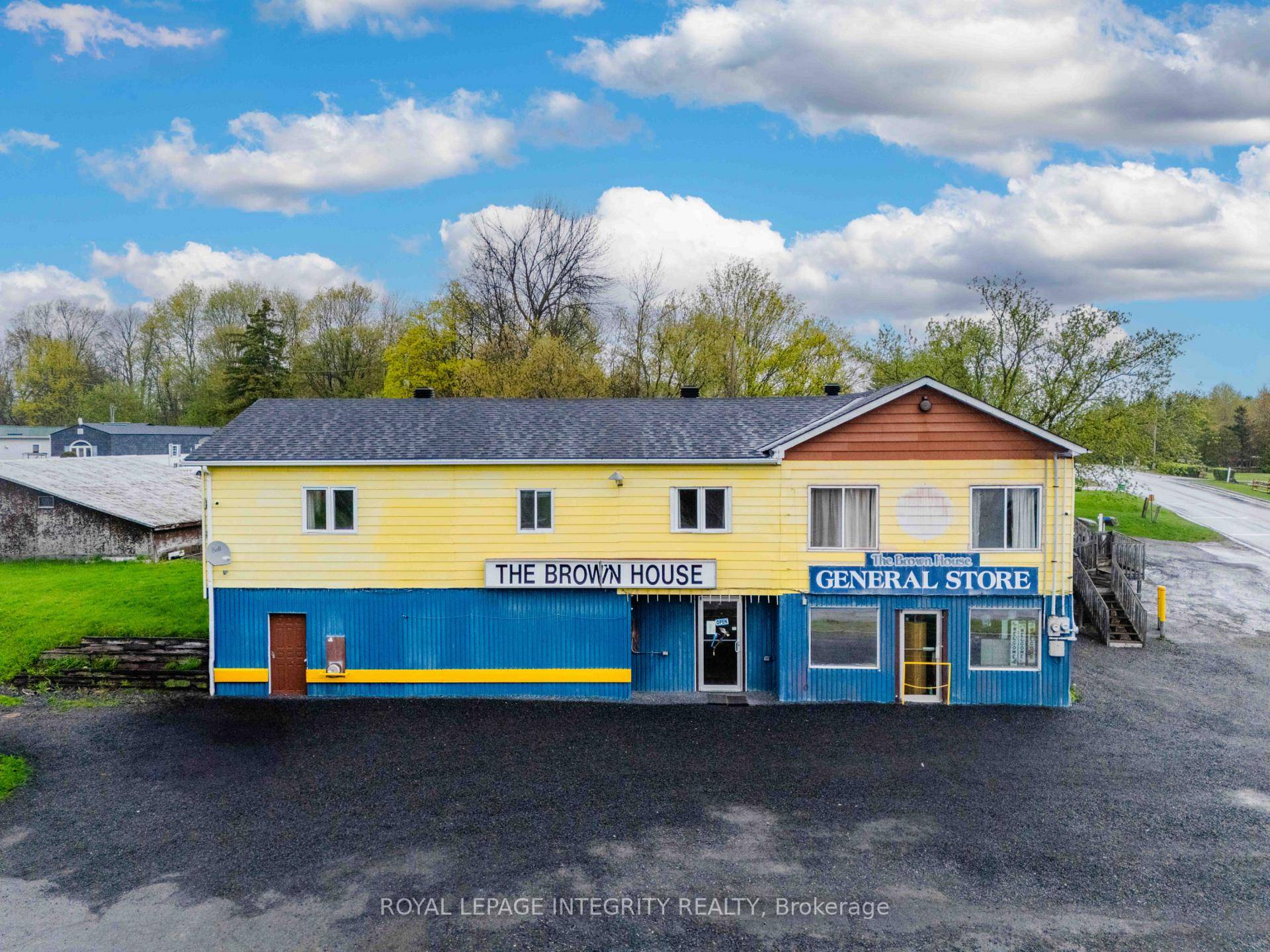 Introducing a versatile commercial property featuring a retail space, two residential apartments, and three leased mobile home spaces offering a unique investment opportunity with multiple income streams.