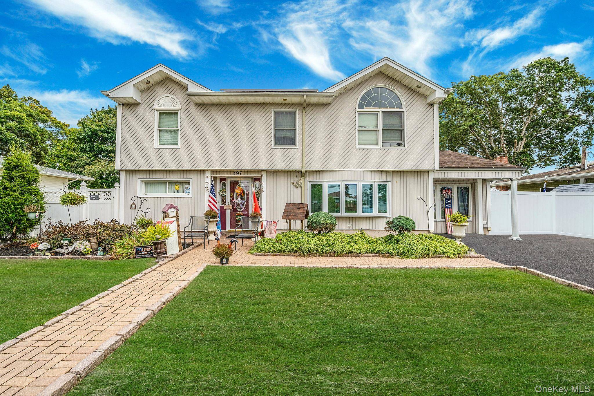 Welcome to this charming and spacious 4 bedroom, 2 bathroom split level home in the heart of Deer Park.