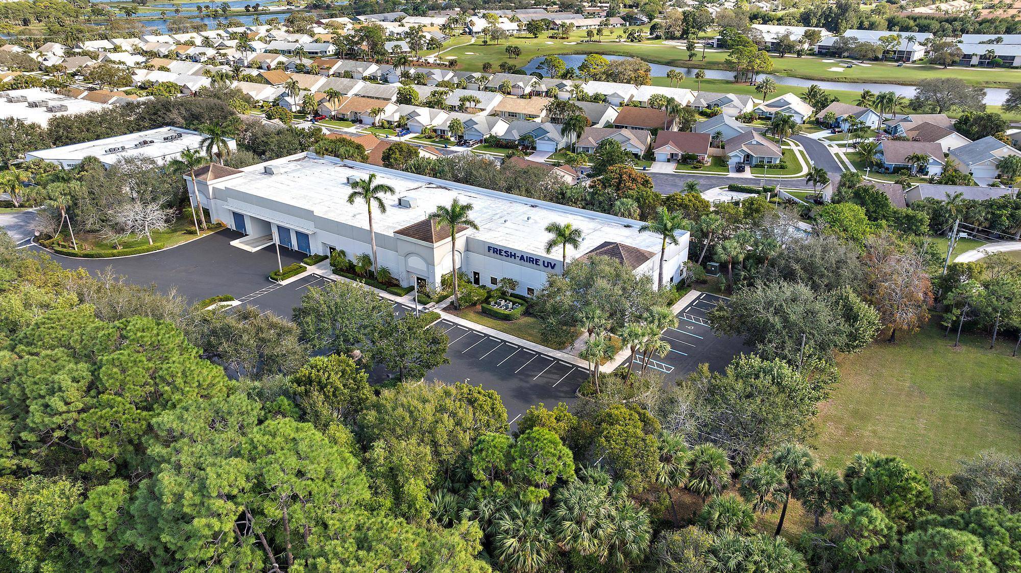 Discover this exceptional opportunity in Jupiter Commerce Park with this versatile 23, 050 SF office warehouse property on a spacious 2.