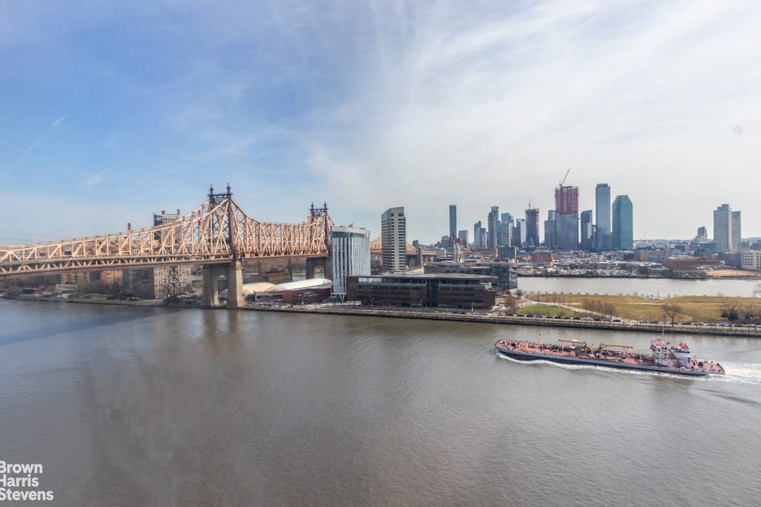 Located in the prestigious One Sutton Place South, this sprawling and beautifully renovated four bedroom apartment boasts gracious room proportions, including an impressive 20x30 foot corner living room with stunning ...