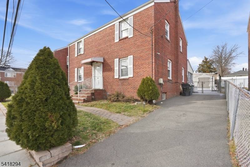 Well maintained brick two family property featuring side by side units, offering added privacy and minimal noise transfer compared to traditional up and down multifamily layouts.