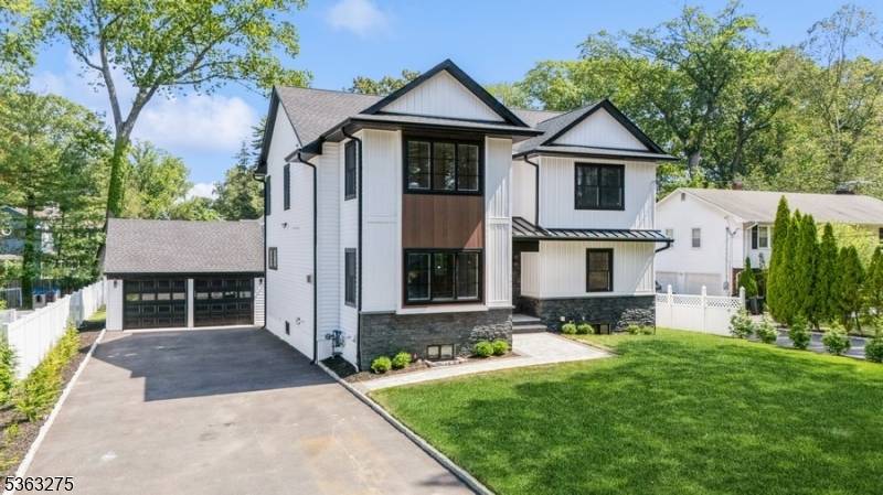 Stunning custom new construction on an existing foundation in highly desirable Oradell !