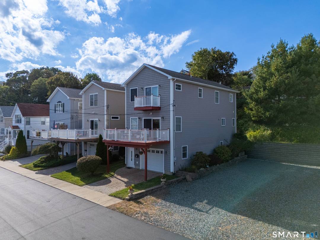 Welcome to this beautifully maintained tri level single family home offering space, comfort, and stunning ocean views in a peaceful West Haven neighborhood.