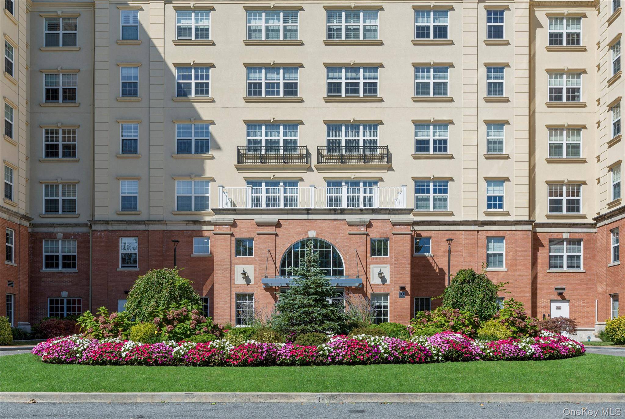 Ideal rental in luxury full service building just steps Larchmont Village shops, restaurants and train.