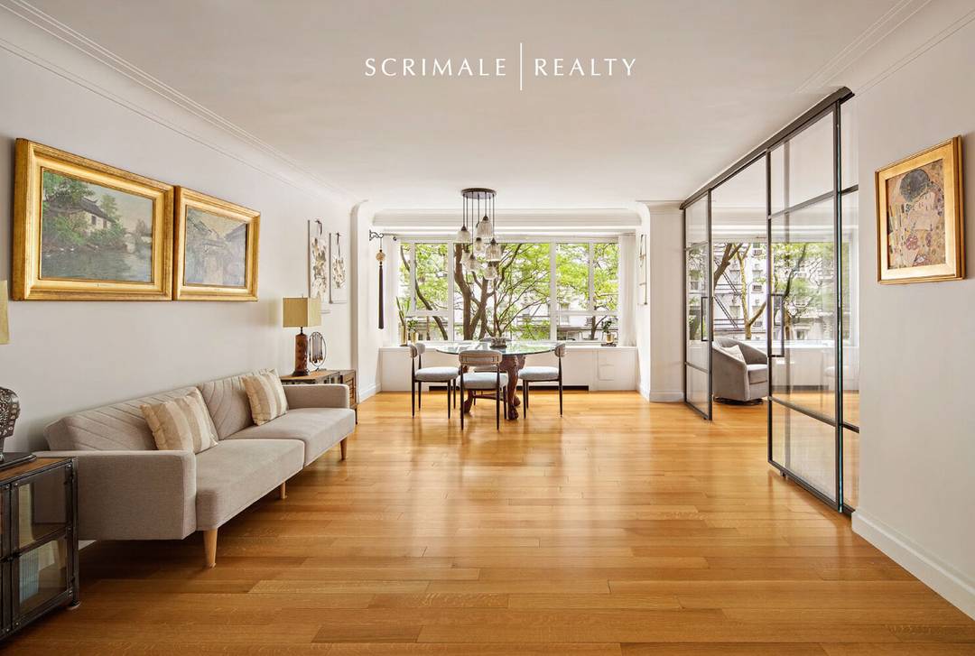 Enjoy serene treetop views and a flexible layout in this beautifully maintained convertible two bedroom, two bathroom residence located in the D Tower.