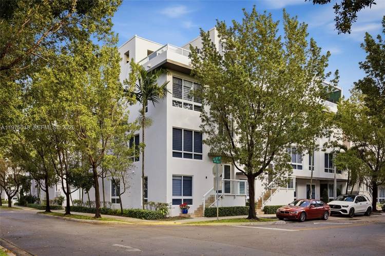 Stunning four level corner townhouse in the heart of Doral.