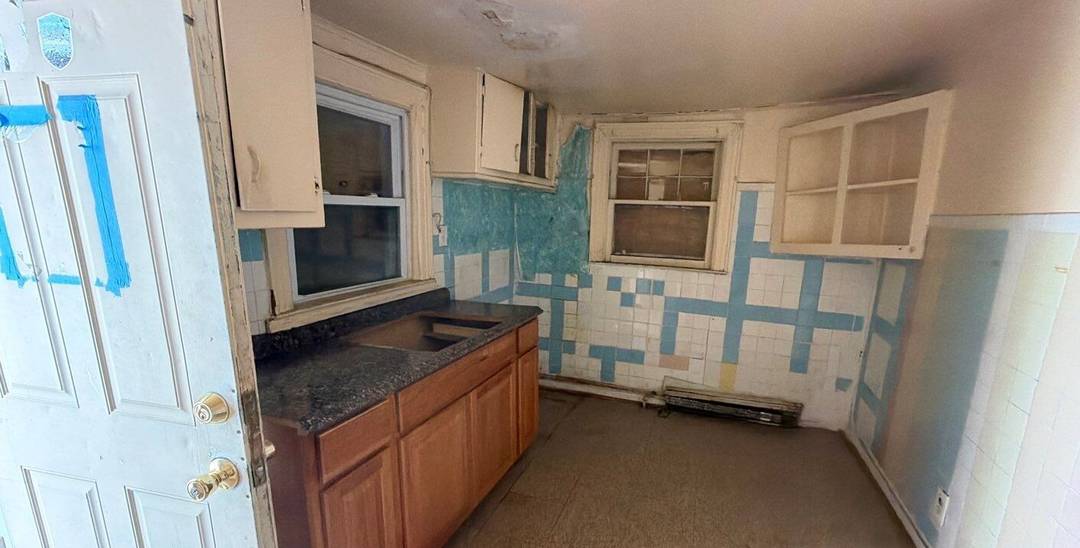 Free standing 2 unit dwelling on an oversized parcel with off street parking in a 1 car, detached garage, and exceptional potential.