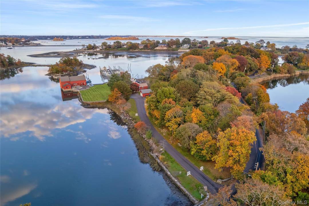 Rare waterfront opportunity offering both sunrise, sunset and a protected deep water dock !