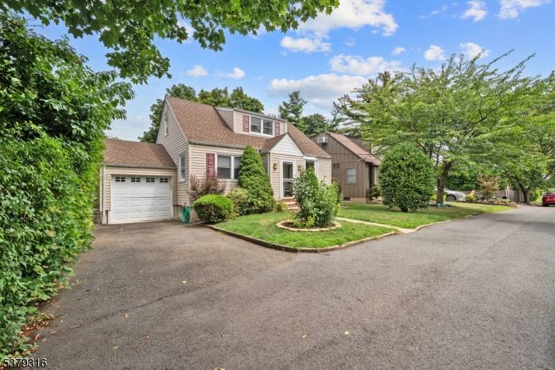 Tucked away on a quiet, private street, this beautifully expanded Cape offers space, comfort, and unbeatable convenience just minutes from NYC transportation, major highways, top rated schools, local shops, and ...