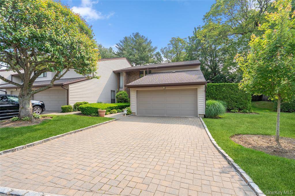 Welcome to this beautifully maintained Chadwick end unit in the gated community of Maple Run.