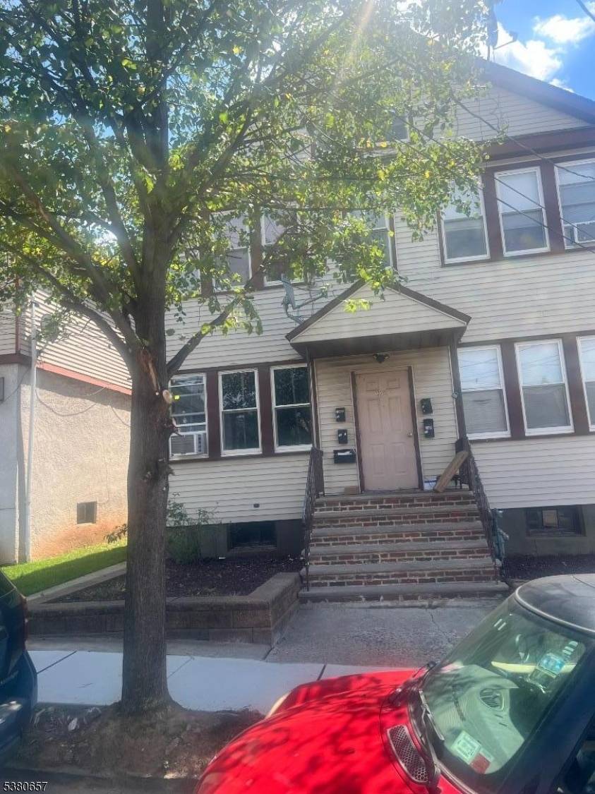 Well Maintained Four Family house, featuring 4 rooms in each apartment, two have two bedrooms eat in kitchen, bathroom and living room on the second floor.