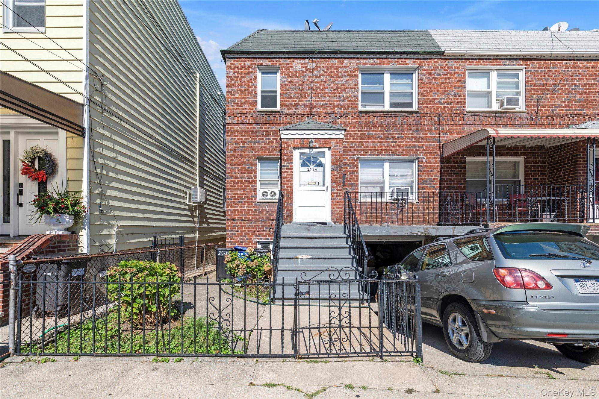 Welcome to this charming two family brick semi detached home in the highly desirable Astoria neighborhood.