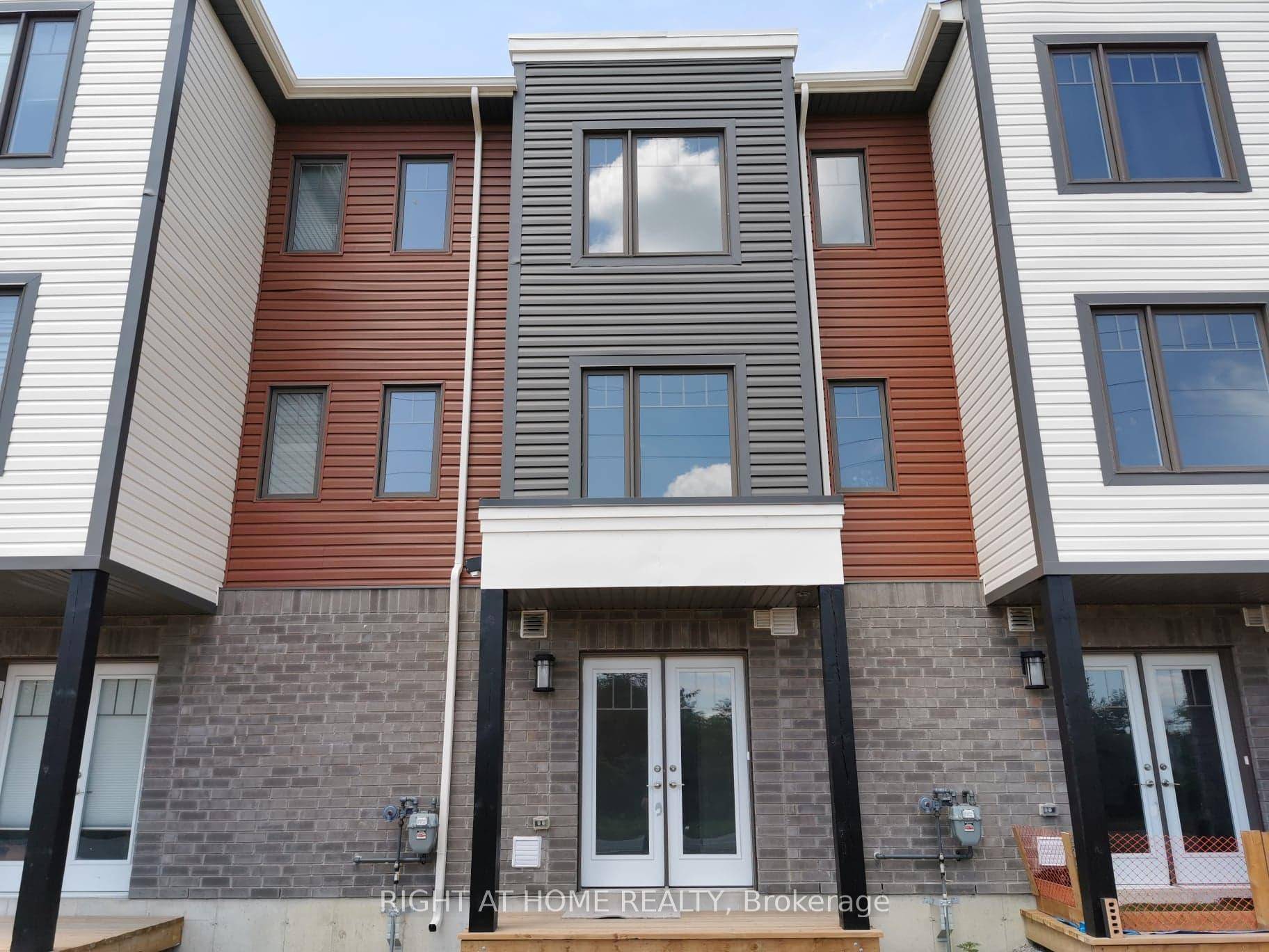 Location, Location ! ! Fall in love with this European style Townhome In Bear Creek Ridge.