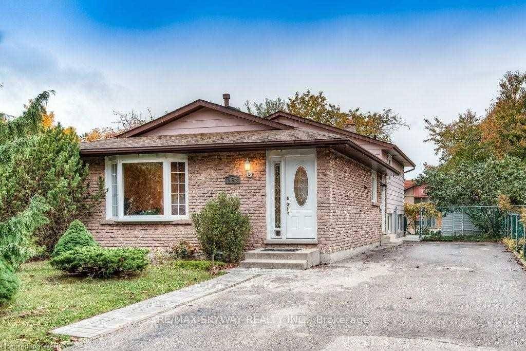 Welcome to this charming and spacious four level backsplit, tucked away on a quiet pie shaped lot in Kitchener.