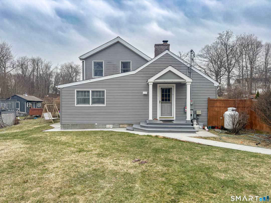 Set on a serene, tree lined road, 207 Stadley Rough Road offers the perfect blend of privacy, comfort, and New England charm.