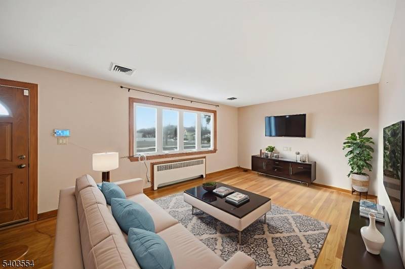 Welcome to 52 Broadway in Clark an inviting, move in ready Cape offering the perfect blend of charm, space, and flexibility.