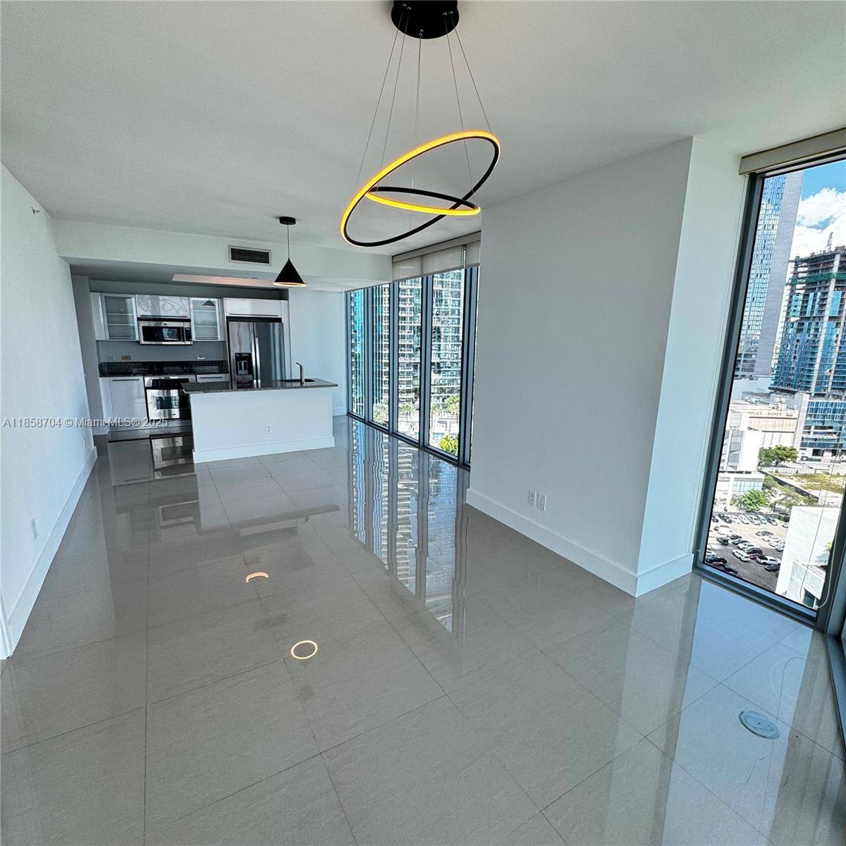 Enjoy your Miami lifestyle with this stunning 2 bed, 2 bath condo at Marina Blue boasting sleek porcelain tile throughout, two balconies, and the rare luxury of two assigned parking ...