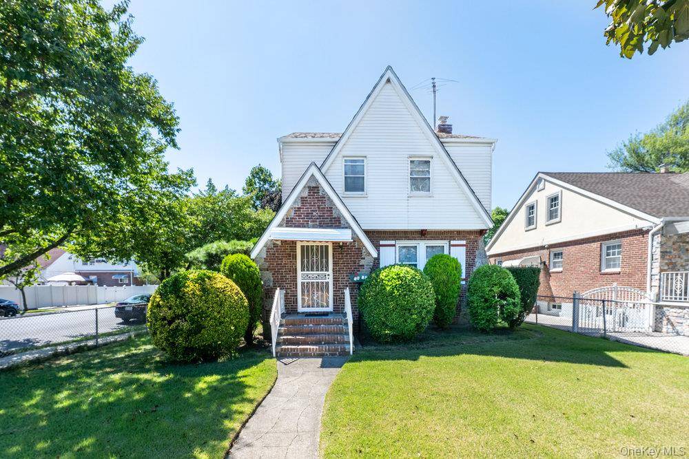 Welcome to this beautifully maintained Tudor Colonial, blending timeless character with thoughtful updates.