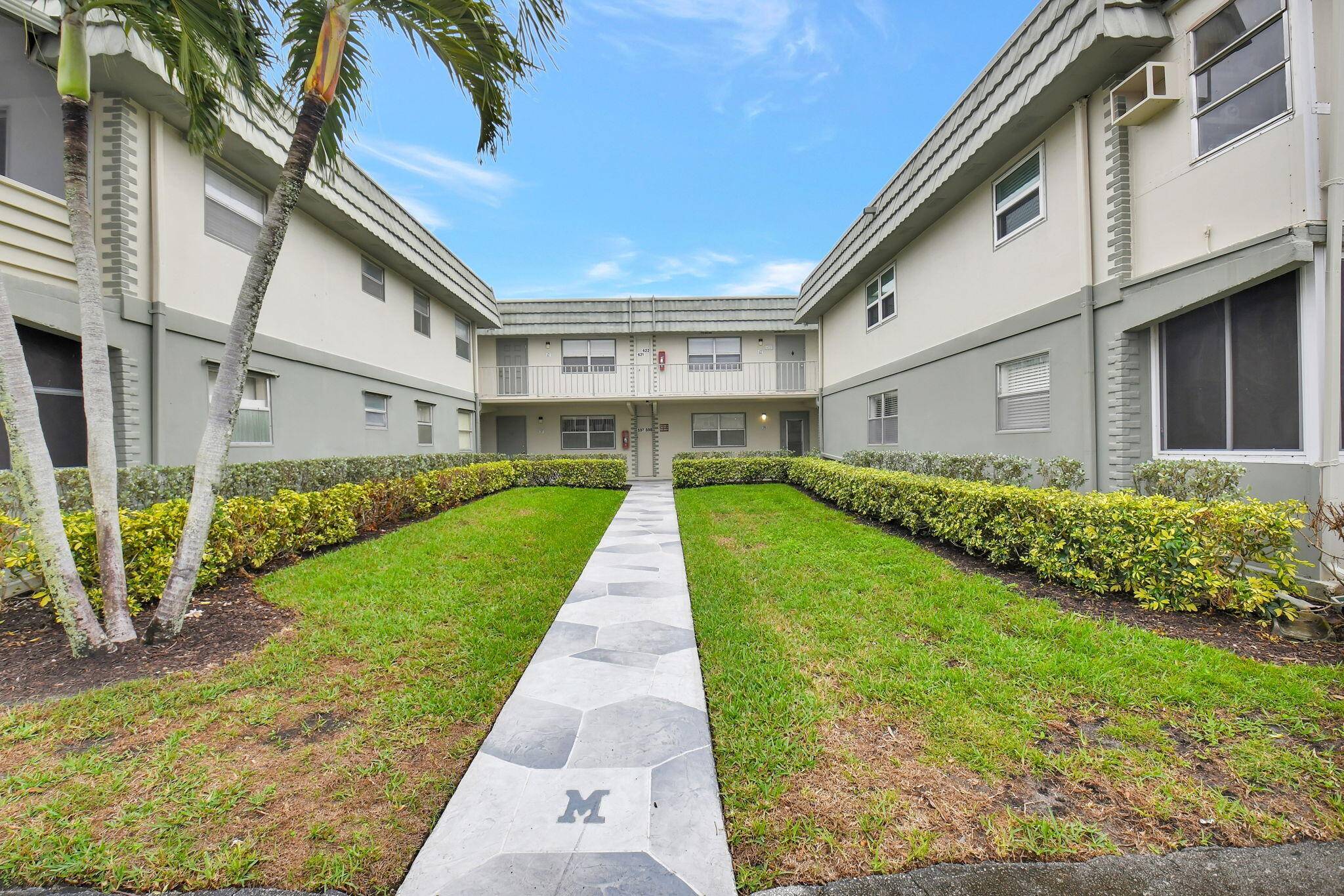 Priced to Sell ! Desirable 1st floor, well kept corner unit.