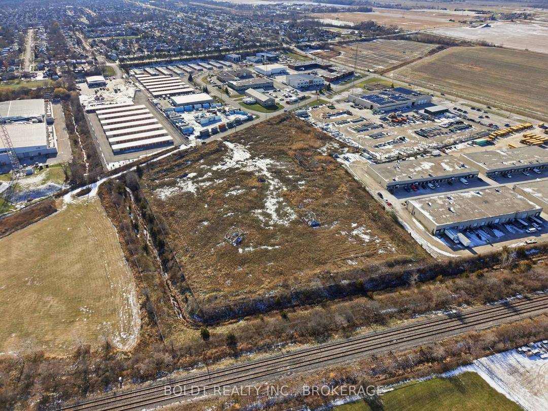 Exceptional 7. 84 acre E2 zoned industrial property offering prime development potential in one of St.