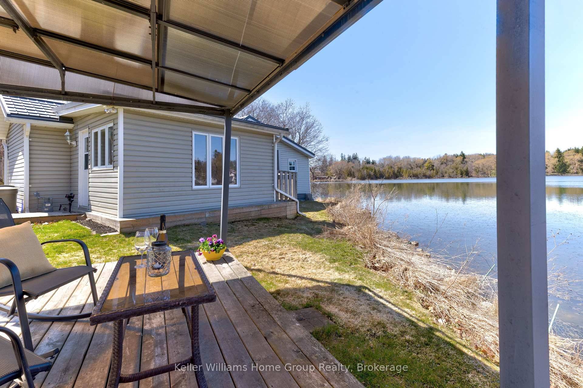 Discover the perfect blend of lakeside tranquility and urban convenience at this Alder Lake bungalow, ideal for downsizers or as a second home.