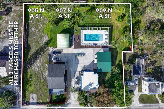 This is a great opportunity to own a fantastic compound or business facility with 4 units, oversized pool, RV carport, Kwanzaa Hut out building for storage or man cave, Plus ...