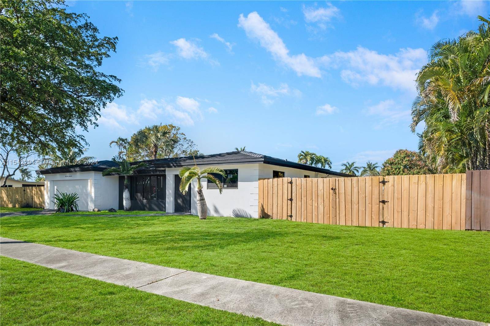 Welcome to your dream home located in the extremely desirable neighborhood of Hollywood with no expense spared.