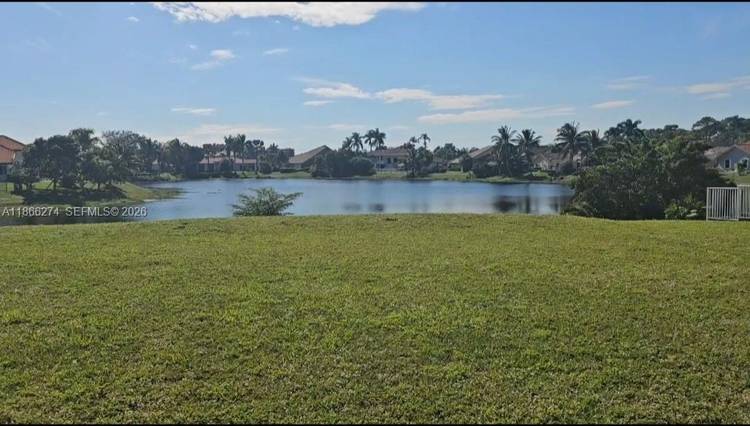 Residential Land on a lake with Plans.