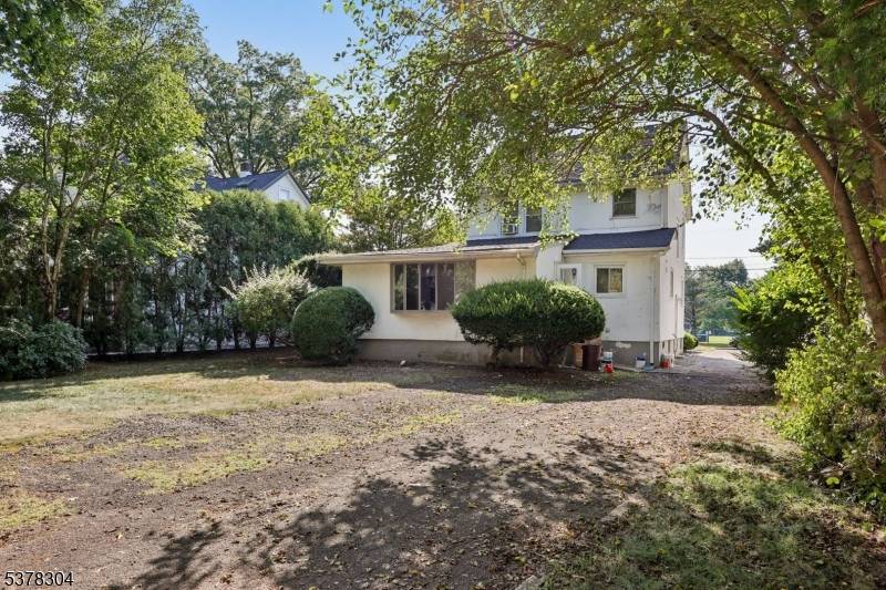 CHARMING TUTOR COLONIAL IN A QUIET STREET WITH CONVENIENT LOCATION.