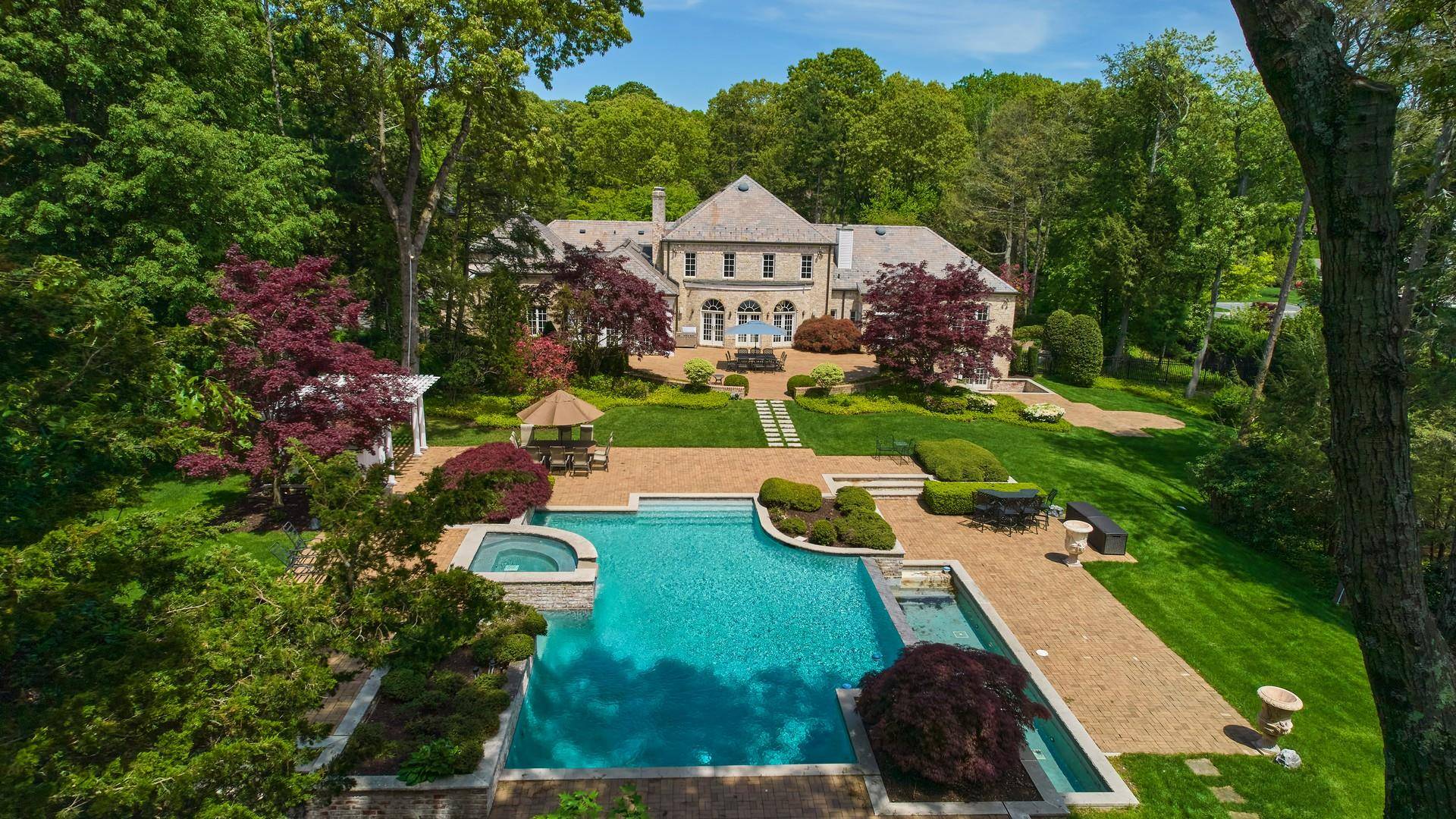 Magnificent Brick Colonial in Prestigious Old Brookville tucked away on a private cul de sac in one of Long Island s most exclusive enclaves, this stately brick Colonial embodies timeless ...