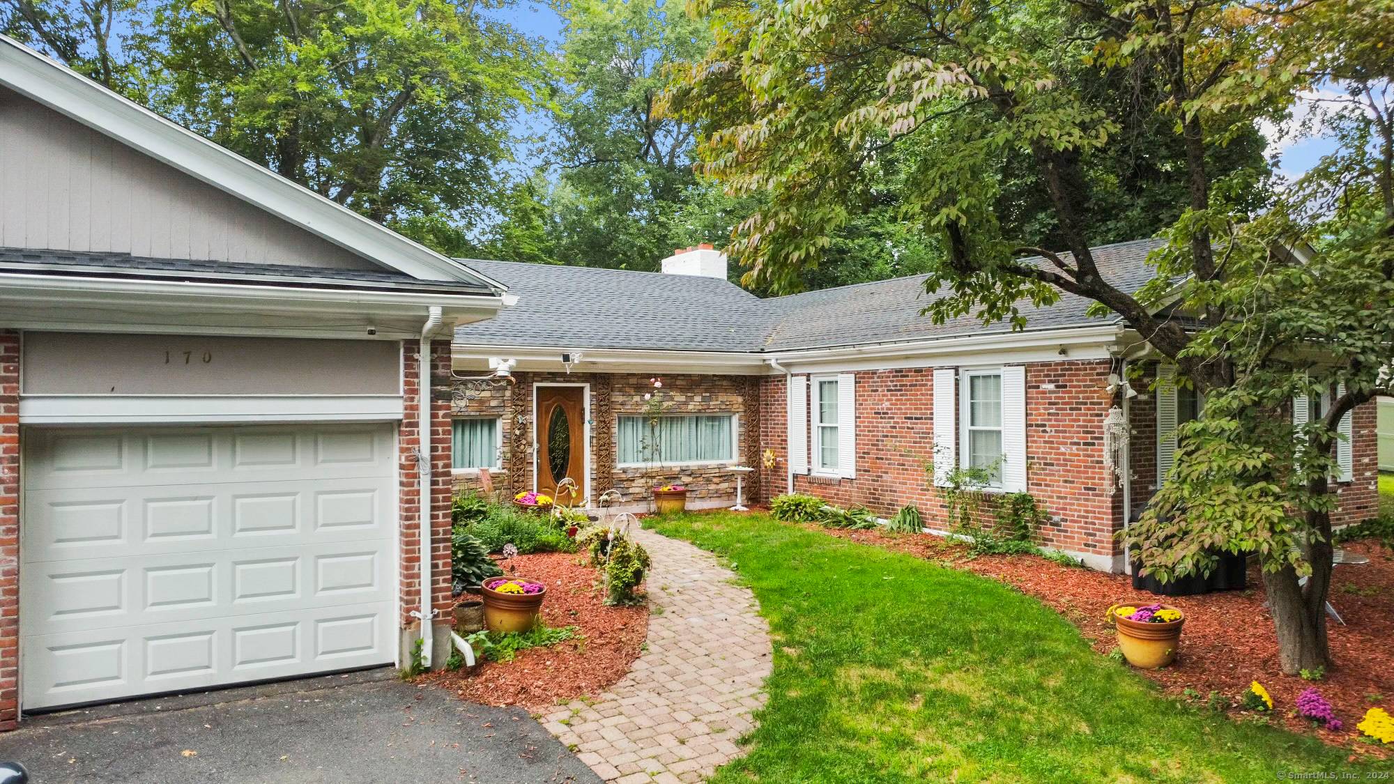 Situated on a quiet street, this one level ranch style home has nearly 2, 800 SF of an open living area with modern luxury and space for everyone with 4 ...