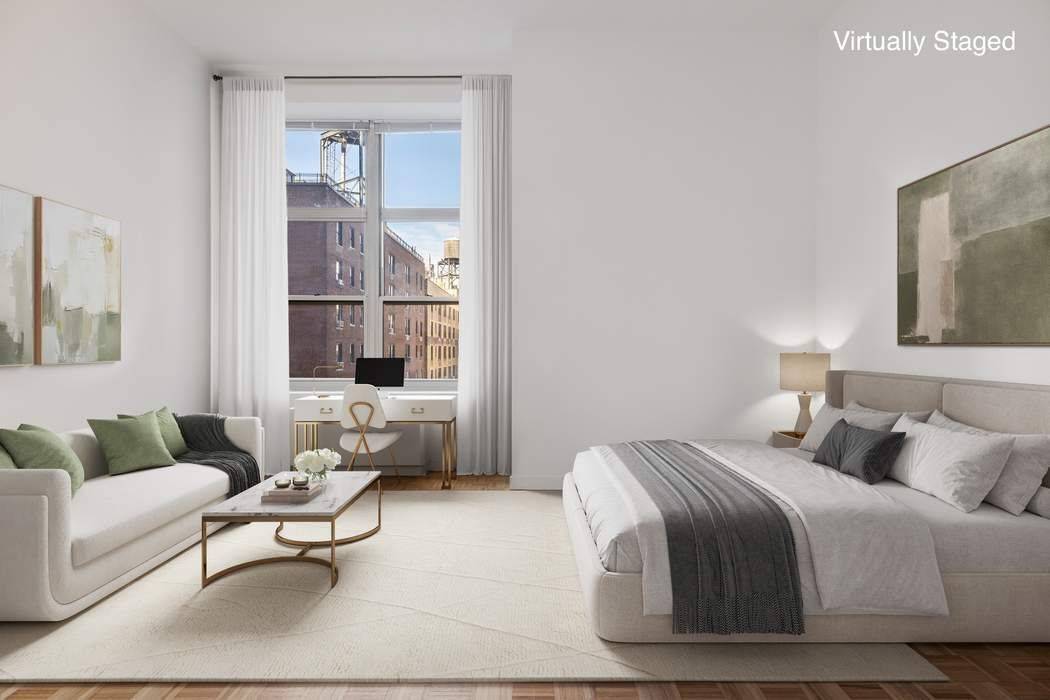 Step into this dramatic, loft like studio where soaring 13 foot ceilings and oversized windows fill the living and sleeping space with abundant natural light.